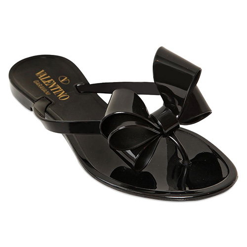 black jelly flip flops with bow